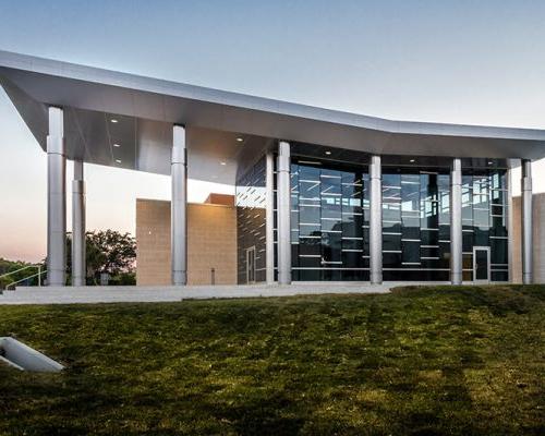 Frisch Welcome Center exterior at dusk